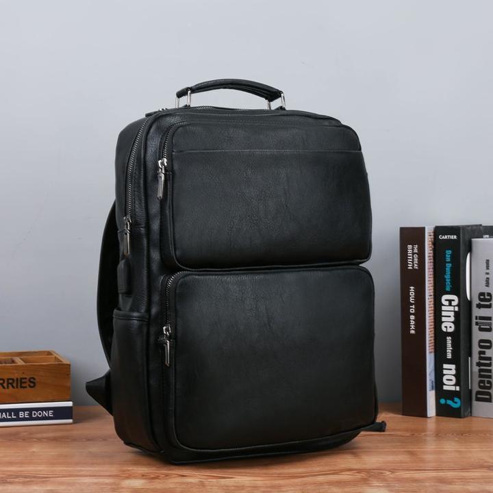 时尚潮流双肩包男皮质商务简约背包中学生书包个性旅行电脑包男包