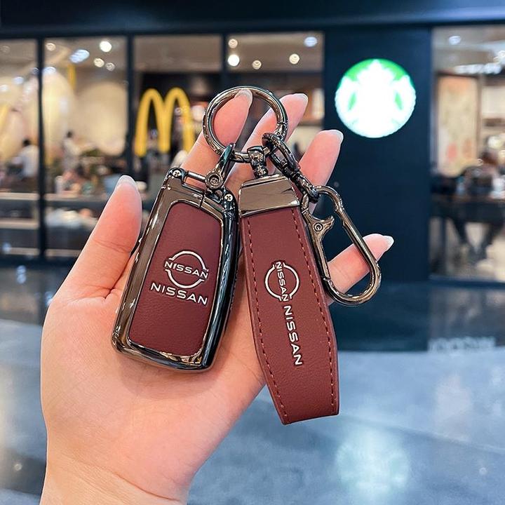 适用于日产轩逸经典钥匙套14代22款骐达车逍客劲客蓝鸟壳奇骏扣包