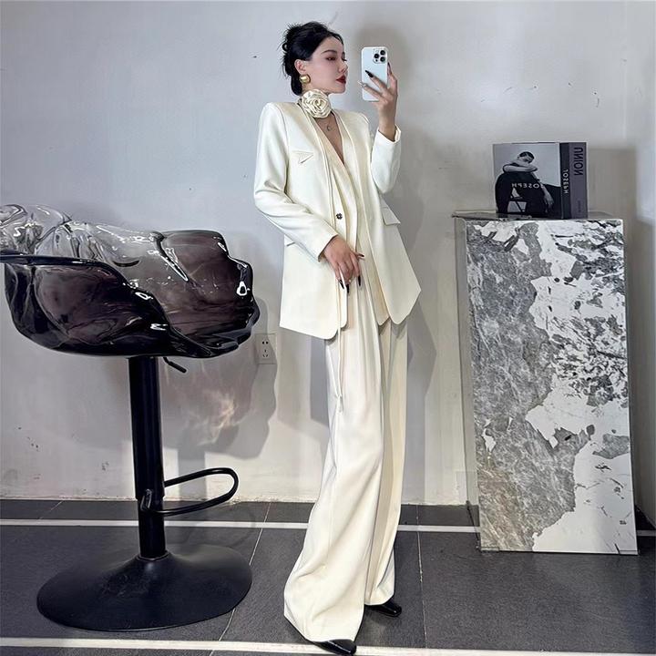 时尚高级感通勤套装2025春秋气质女神范西服外套直筒裤两件套纯色