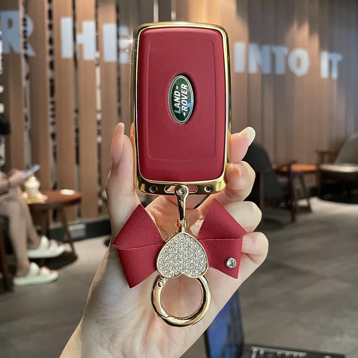 路虎钥匙套揽胜运动版极光星脉轻奢包神行5发现4卫士女扣专用