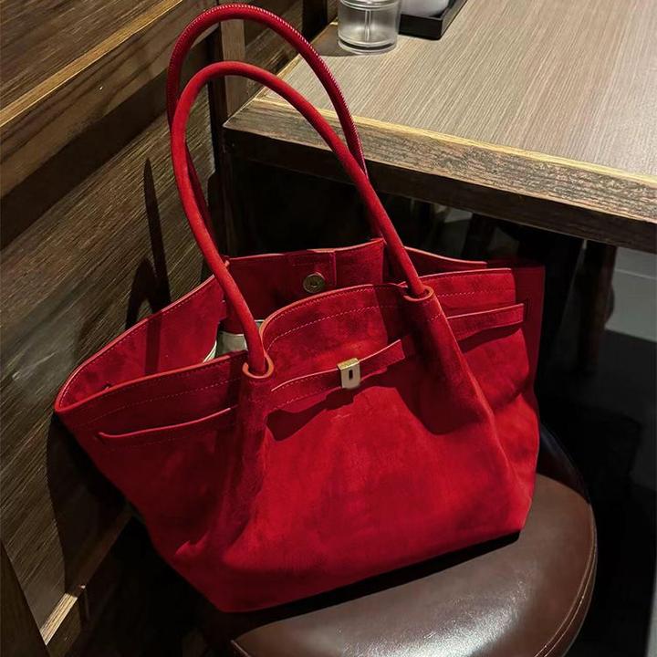 红色麂皮大容量饺子包包女式2025新款高级感手提新娘结婚包秋冬季