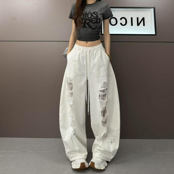 【小版型】YY拼接镂空蕾丝个性破洞时尚牛仔裤833