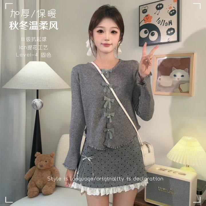 提花保暖设计感复古蝴蝶纽扣针织开衫毛衣软糯百搭休闲秋冬外套女