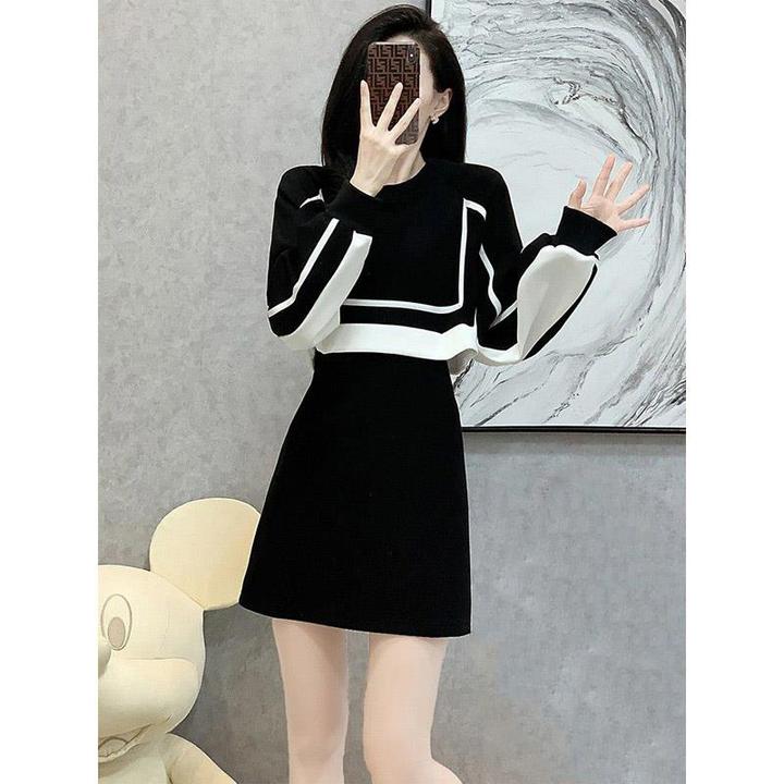 欧货黑色连衣裙女春装2025新款气质女神范收腰显瘦卫衣裙子两件套