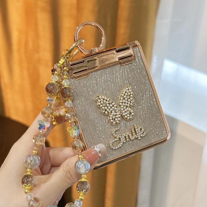 适用华为pocket2手机壳折叠屏金色闪粉水波纹蝴蝶镶钻指环保护套