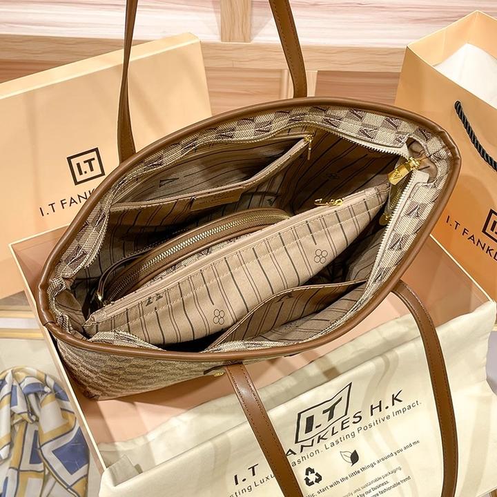 香港牛皮大容量托特包女2026新款春秋高级感真皮女包单肩子母大包