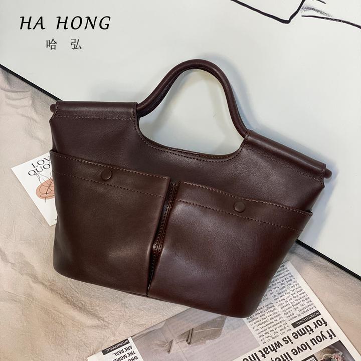哈弘新款头层牛皮大容量托特女包双口袋通勤手提包小众软皮复古包