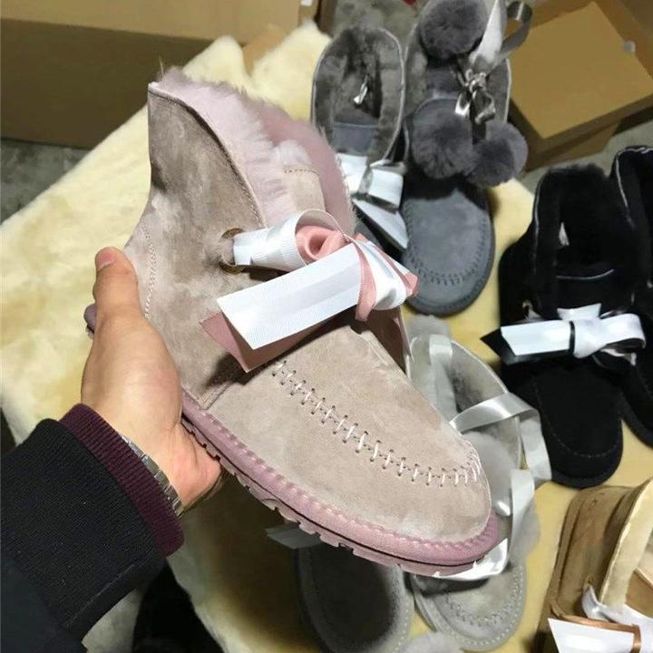 爆款短筒凯琳两穿蝴蝶结羊皮毛一体雪地靴羊毛球棉鞋羊毛丝带棉鞋