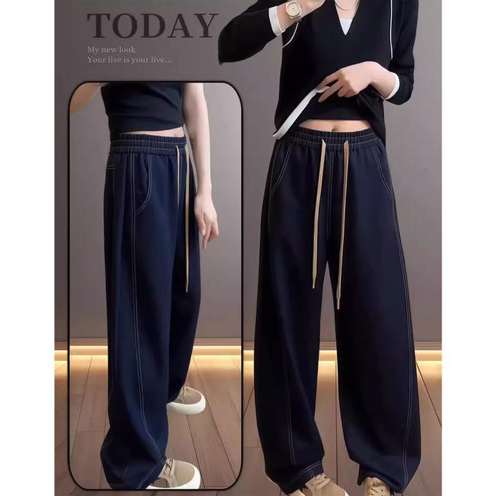 深蓝色松紧腰牛仔裤女秋季新款大码胖mm高腰显瘦时尚抽绳弯刀裤