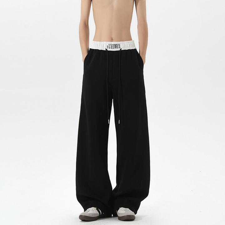 秋季男士休闲裤韩版宽松弯刀裤卫裤2025秋季新款大码胖人长裤