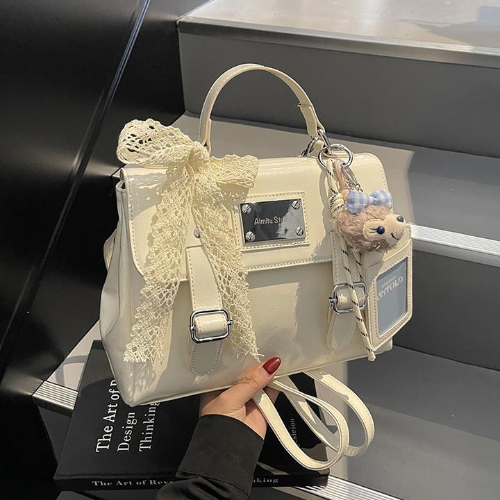 艾米兔 X COOLE女包2025新款百搭通勤简约休闲学院风手提双肩包