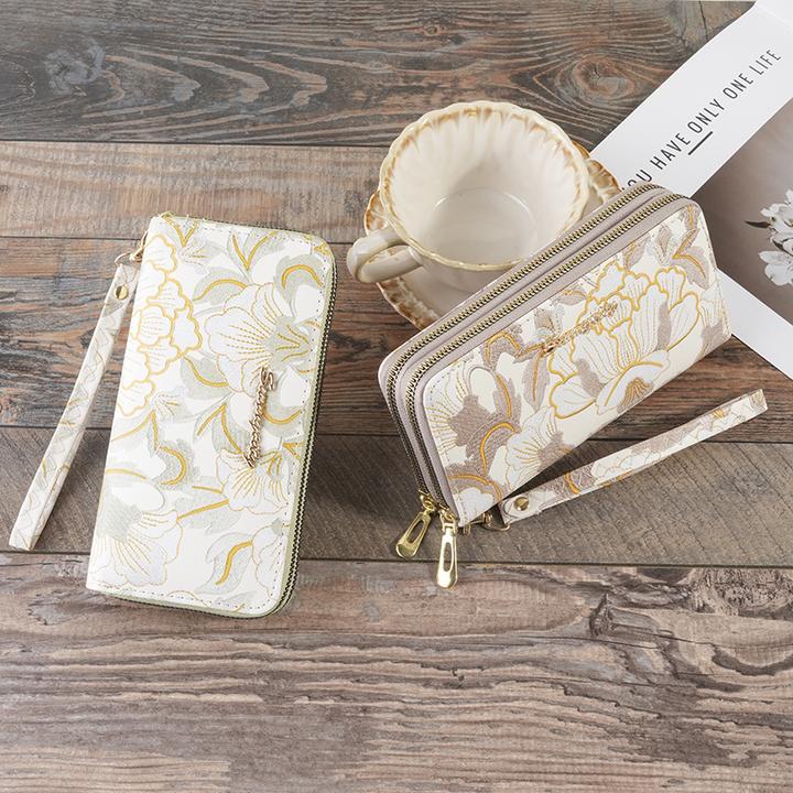 女士钱包新款大容量小清新时尚花朵印花五金配件pu新潮手拿包女款