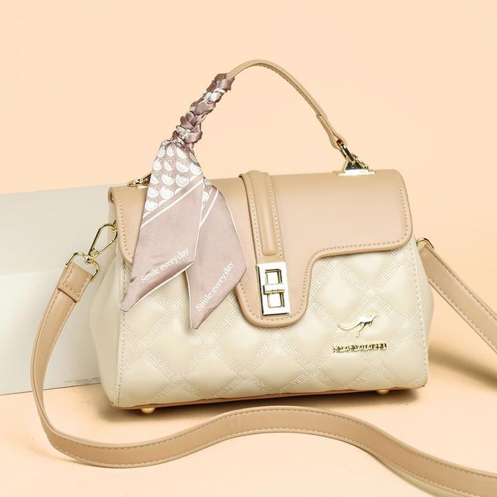 米琦袋鼠真皮女包2025新款时尚百搭斜挎包小方包通勤手提包送妈妈