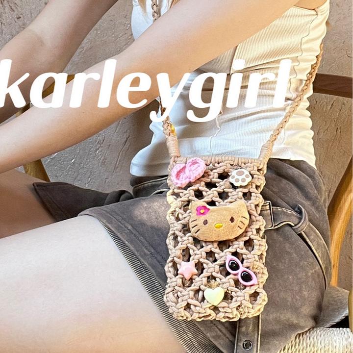 新款夏威夷黑皮kt小猫手工编织手机包夏季度假遛弯百搭斜挎包收纳