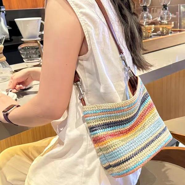 包包女式2025新款春夏小众设计彩虹编织配牛皮单肩包通勤水桶包潮