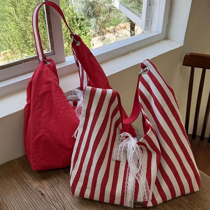 条纹帆布包包女夏天2025新款潮韩国字母印花双面单肩包学生上课包