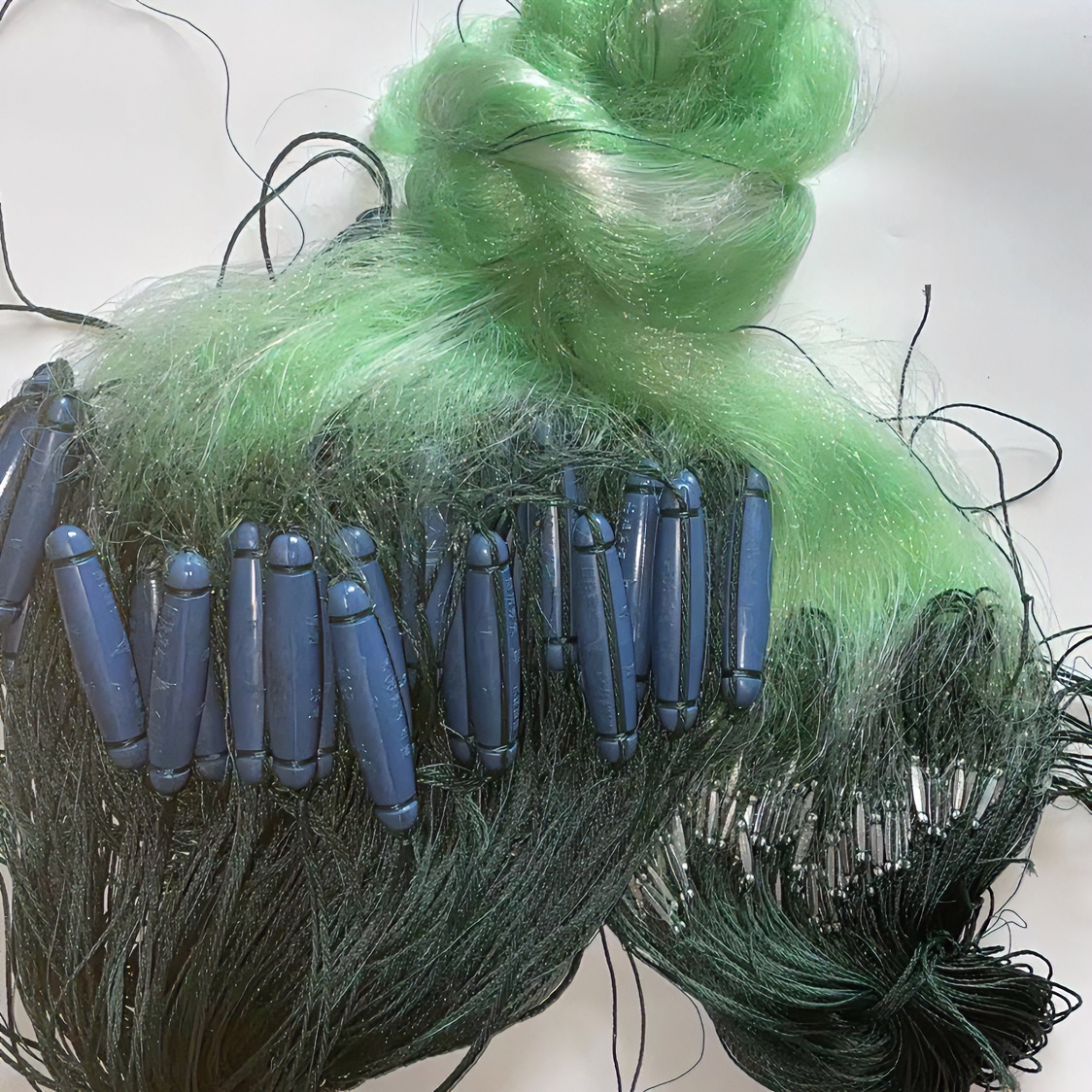 浮网三层渔网塑料浮鱼尾坠淌网进口绿丝丝网捕鱼渔具厂家直销