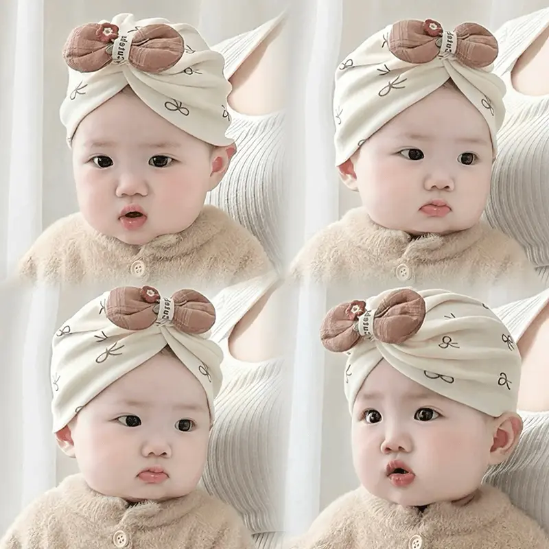 宝宝帽子春秋季蝴蝶结套头帽新生儿0-6月婴幼儿护囟门胎帽包头帽