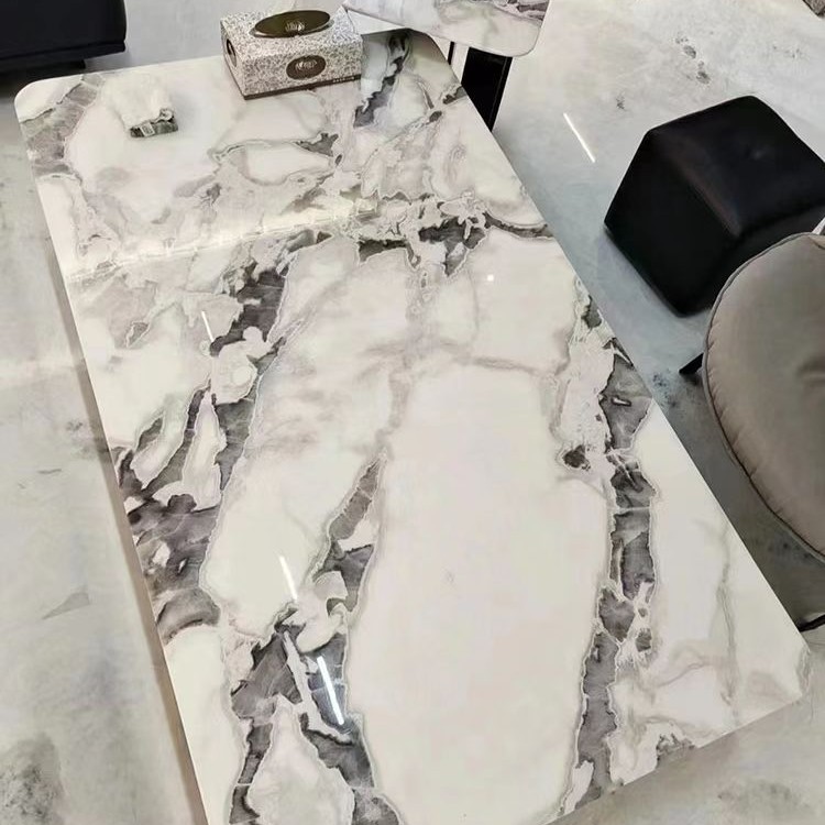 天然大理石芬迪白奢石餐桌和毕加索奢石餐桌是同一品种轻奢意式