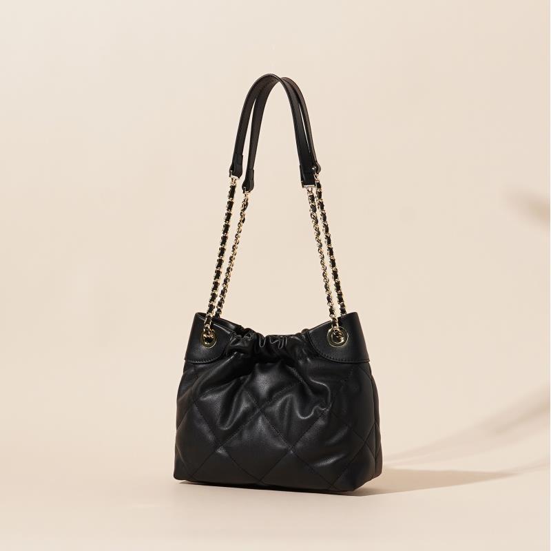 岩牛2025新款时尚百搭简约经典头层牛皮垃圾袋包包YN3473