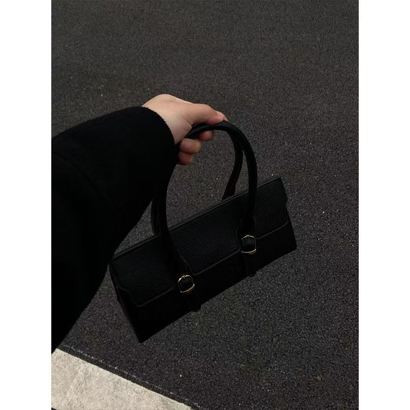 超火手提法棍包包女士2024新款秋冬轻奢小众高级感通勤单肩斜挎包
