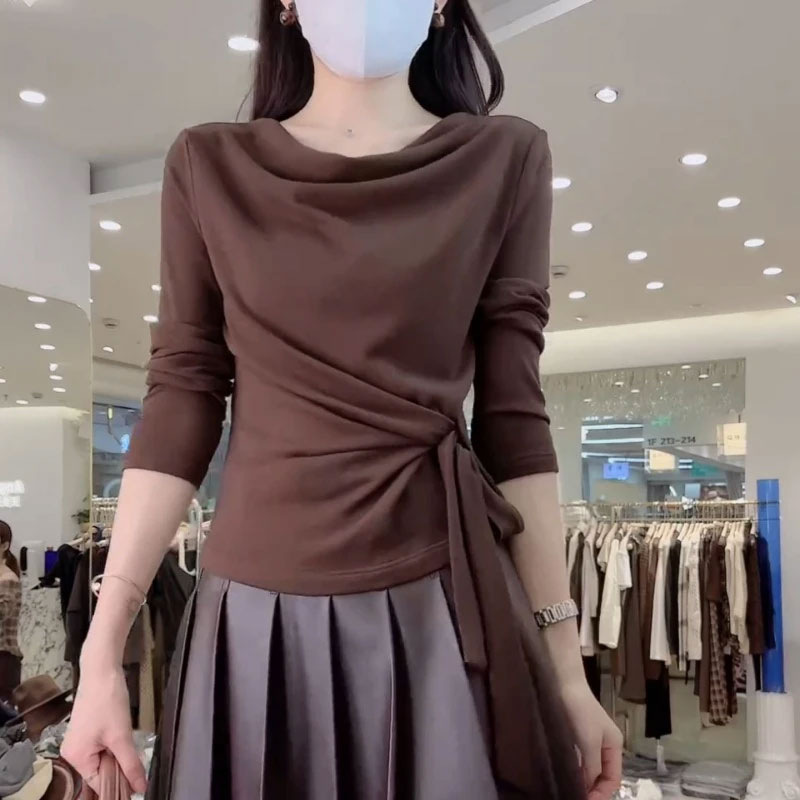 高级感交叉收腰长袖t恤女秋季韩版小众设计气质显瘦内搭打底上衣