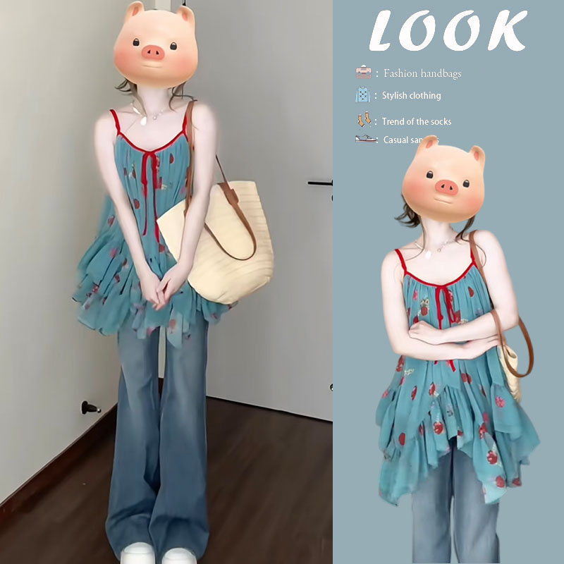 夏季温柔系穿搭女2025新款韩版时尚设计感不规则蓝色吊带裙上衣女