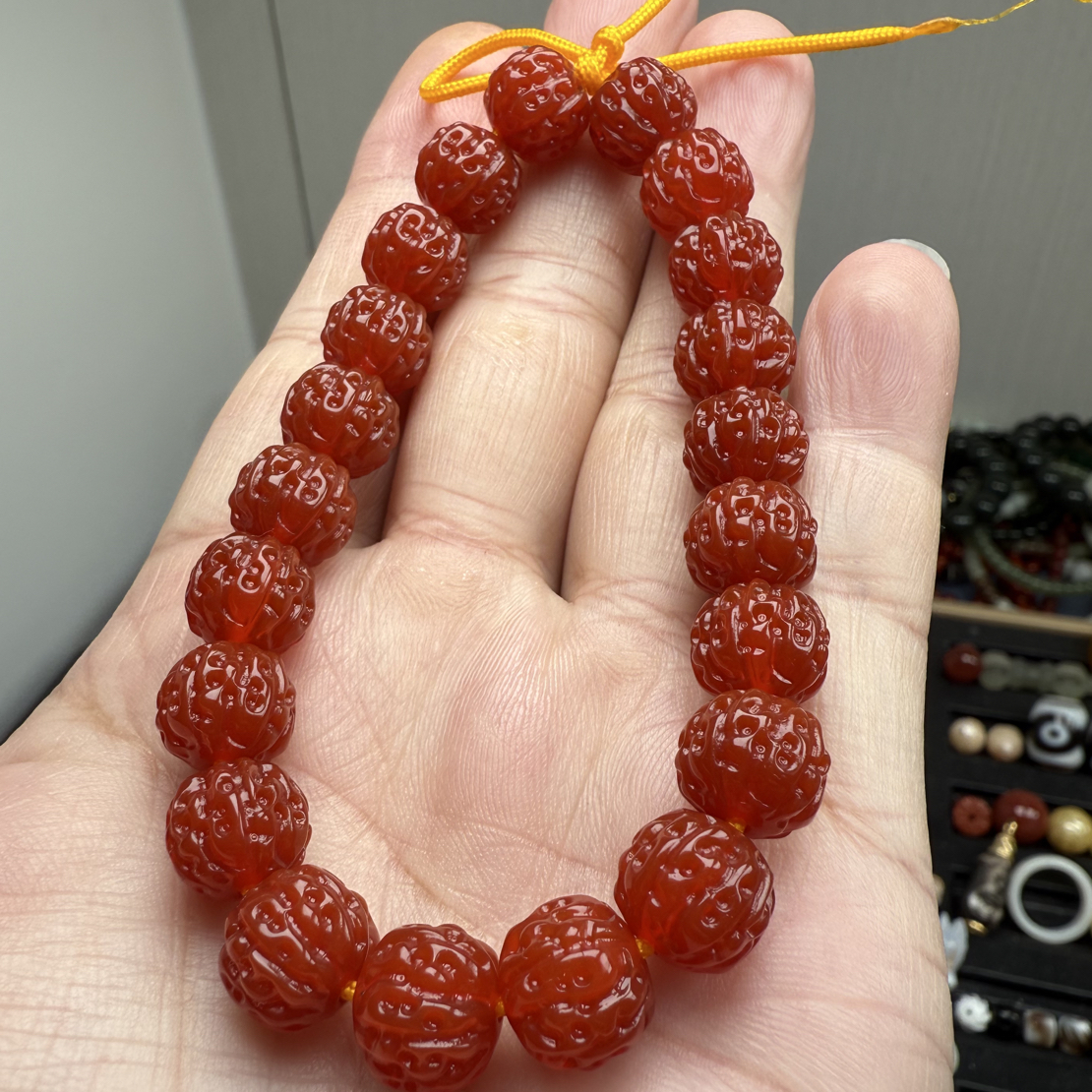 柿子红玛瑙金刚发其中一颗尺寸12.8mm