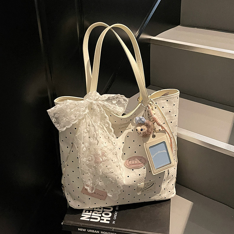 艾米兔女包2025新款日常单肩百搭通勤小众设计大容量时尚双肩包