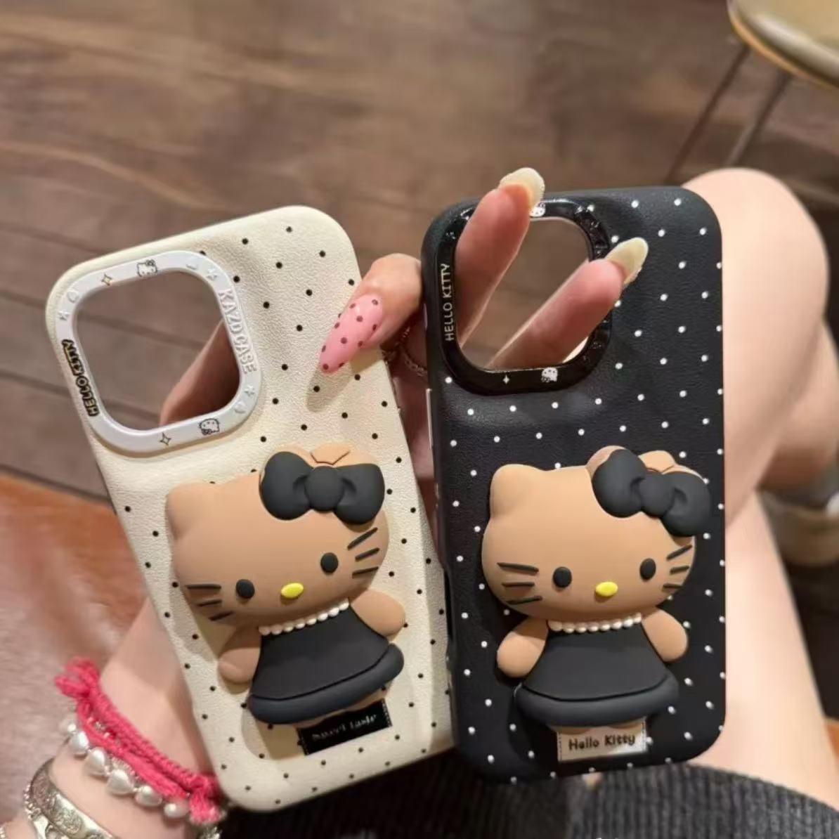 立体黑皮Kitty波点鼓包适用iPhone16promax手机壳苹果15少女14/13