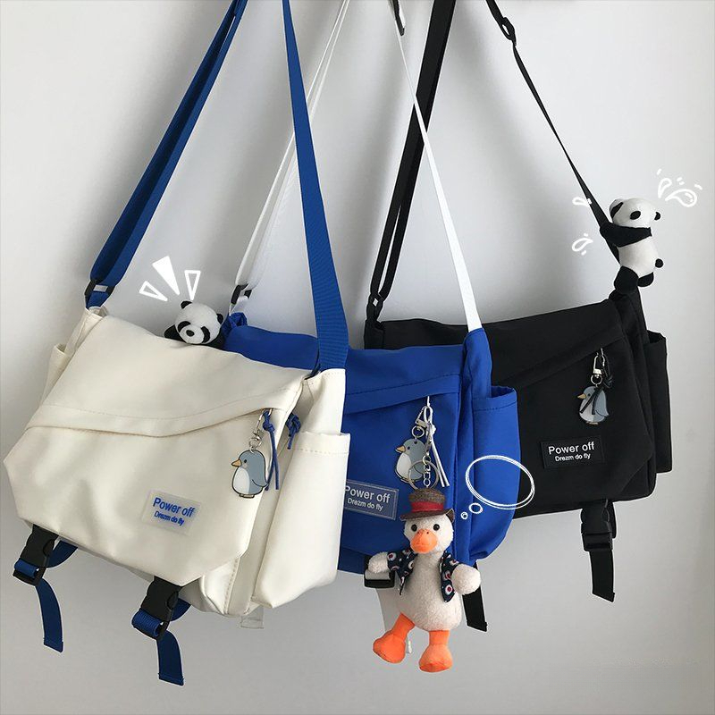 ins风克莱因蓝大容量斜挎包大学生上课包韩版百搭个性单肩书包