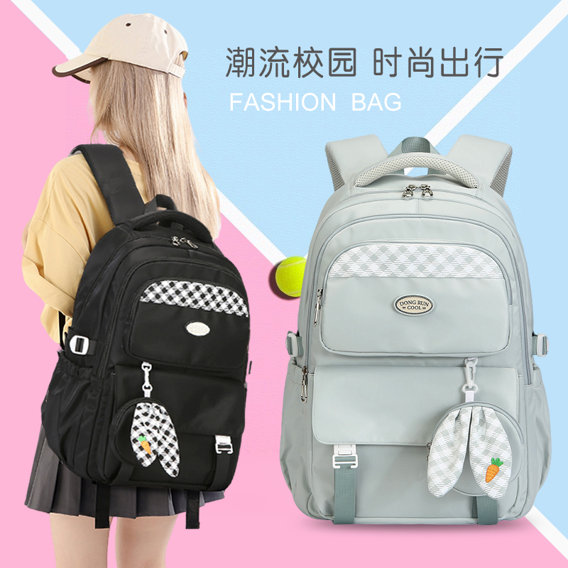 韩版初中生书包男女时尚休闲双肩包高中大学生轻便减负背包旅行包