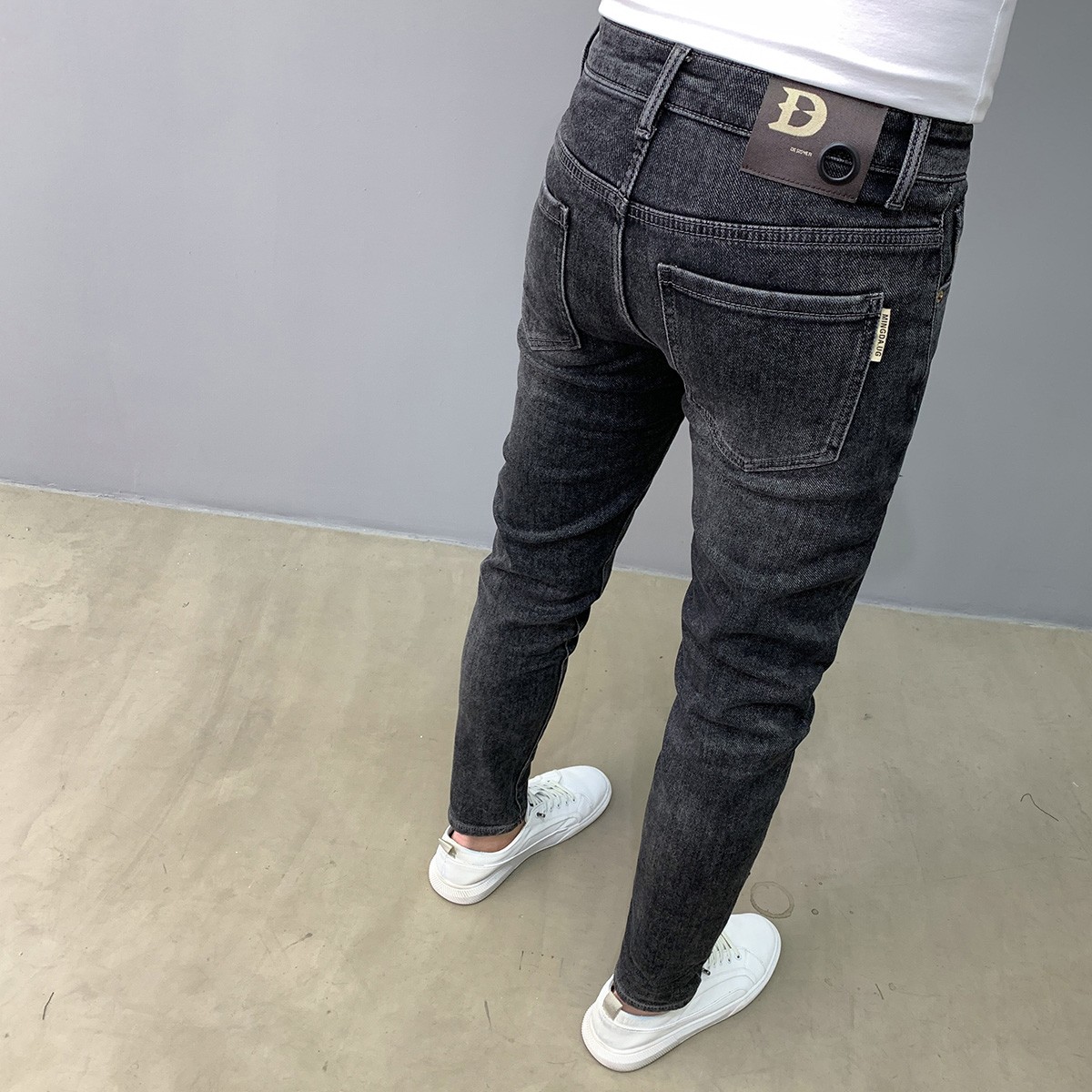 水洗黑色牛仔裤男秋冬新款九分时尚刺绣复古韩版修身弹力小脚长裤