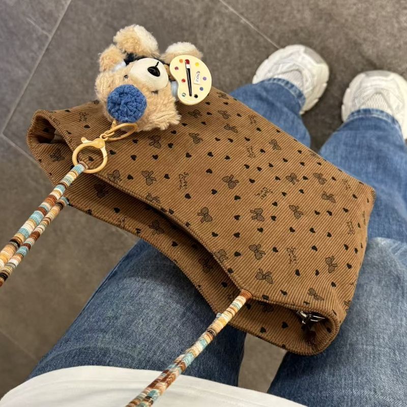 美拉德包包大容量2025新款单肩时尚百搭腋下通勤手提外出托特包