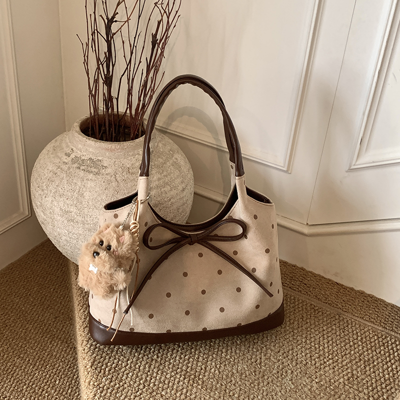 新款秋冬波点可爱文艺风大容量手提单肩包通勤小众设计简约蝴蝶结