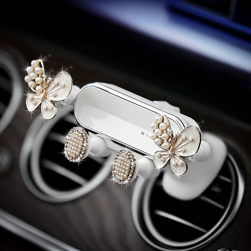 小蝴蝶汽车手机支架车载出风口导航支撑架多功能车内装饰用品大全