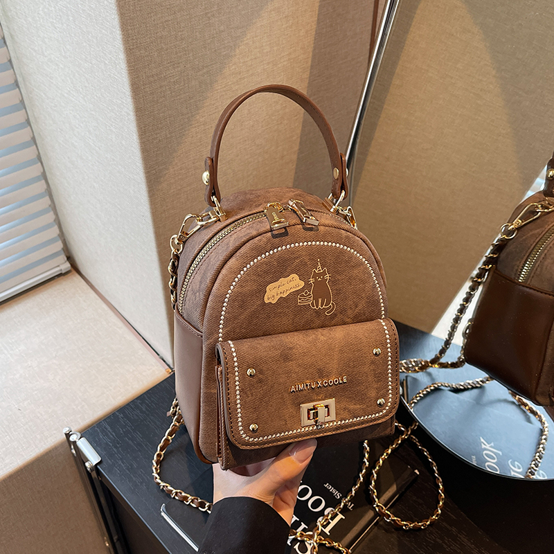 艾米兔女包2025新款简约百搭猫咪图案小众设计质感通勤手提双肩包