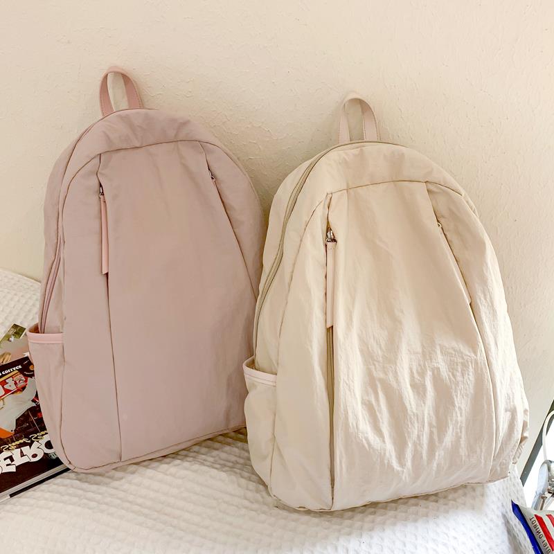 纯色双肩包女旅游轻便背包新款旅行超轻通勤便携小书包女学生
