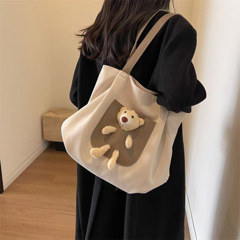 休闲大容量包包女2025新款简约百搭通勤单肩托特包轻便旅行包