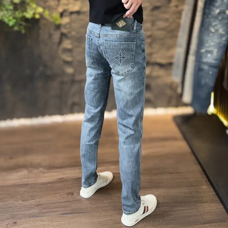 春秋季潮流牛仔裤欧货男士小脚长裤铜钱印花时尚修身弹力休闲百搭