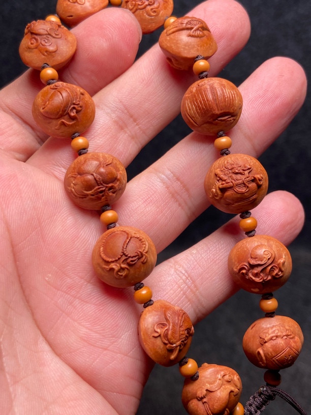 1.55左右尺寸龙纹桃核雕刻法器多宝手持手串