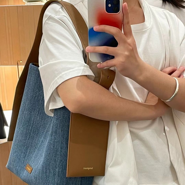 真皮挂耳托特包2025新款女大包14寸电脑包单肩斜挎大容量通勤女包