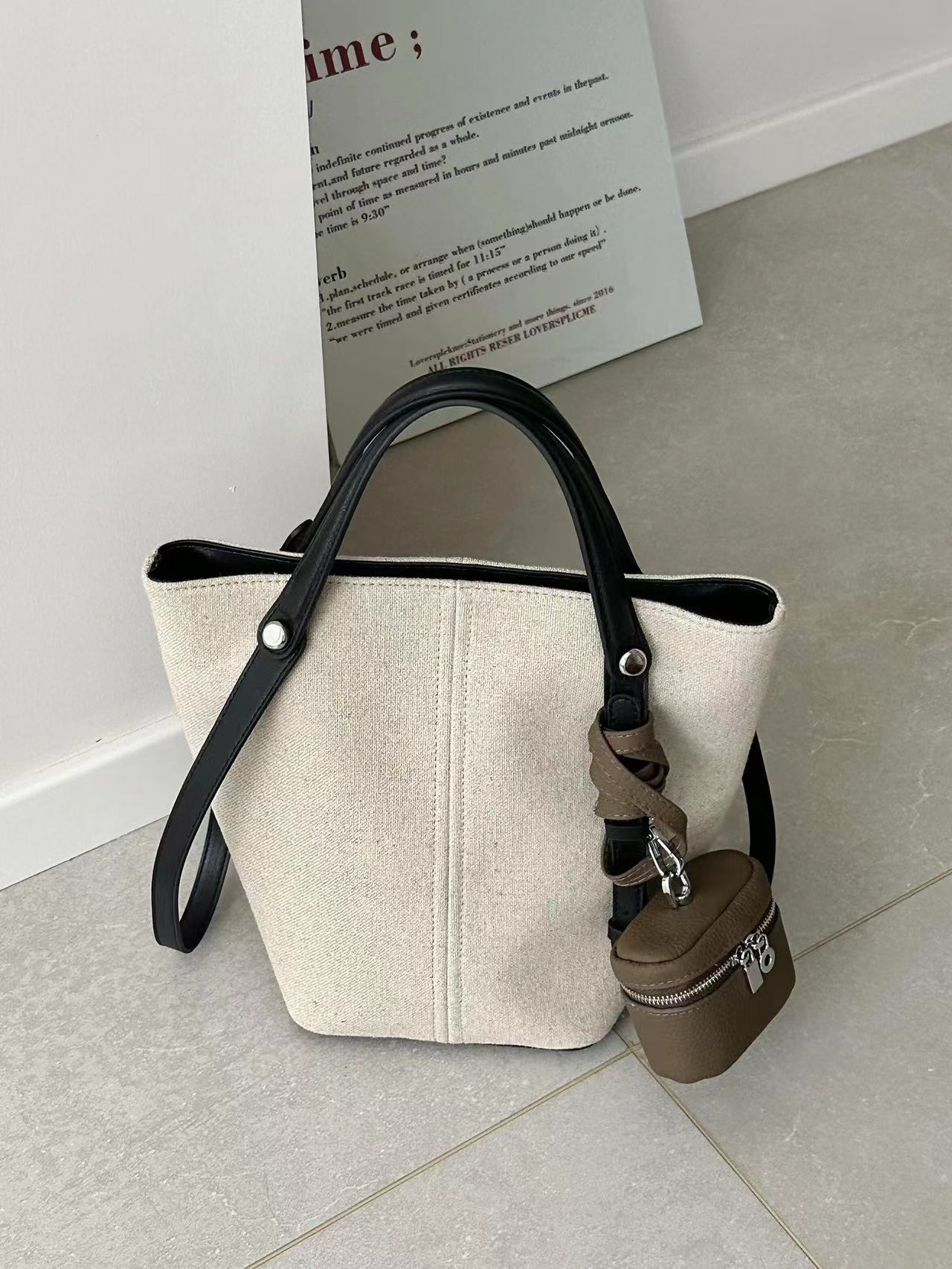 小众纯色都市简约水桶包斜跨单肩包简约休闲肩包