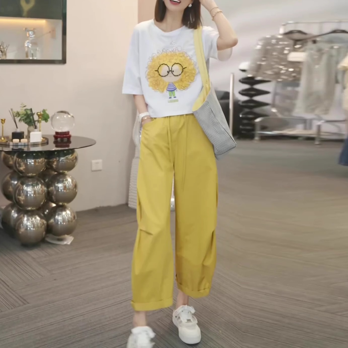 穿搭一整套女2025夏季新款休闲运动减龄显瘦印花T恤九分裤两件套