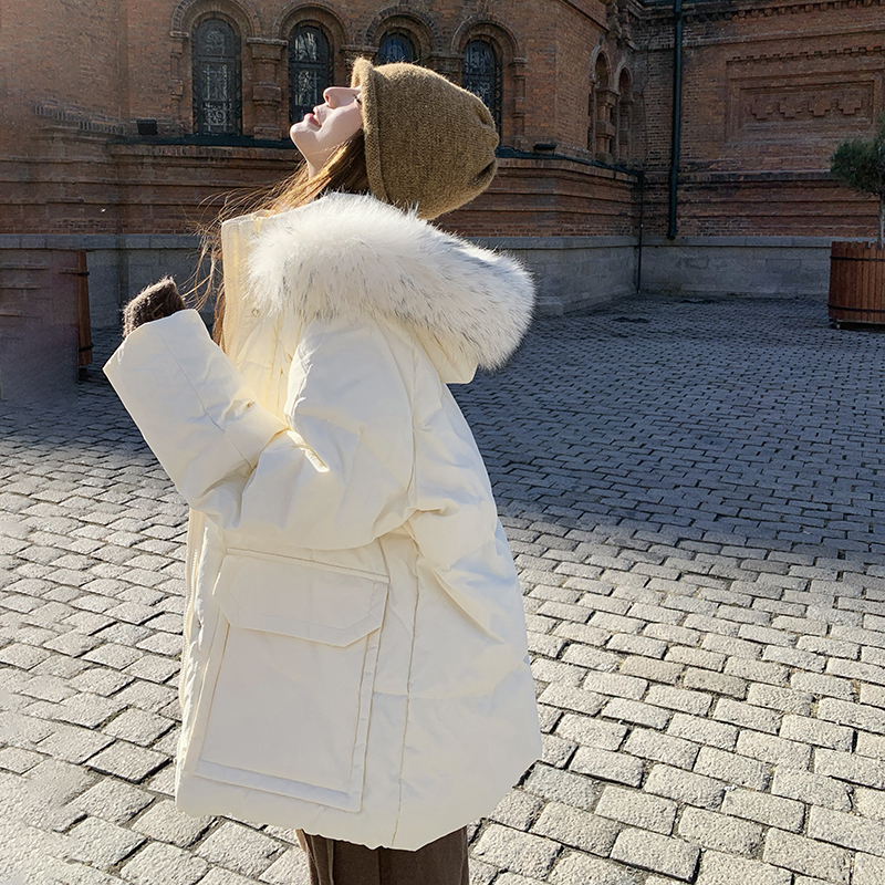 米白色大毛领羽绒服女冬季2025新款白鸭绒外套独特设计流行爆款