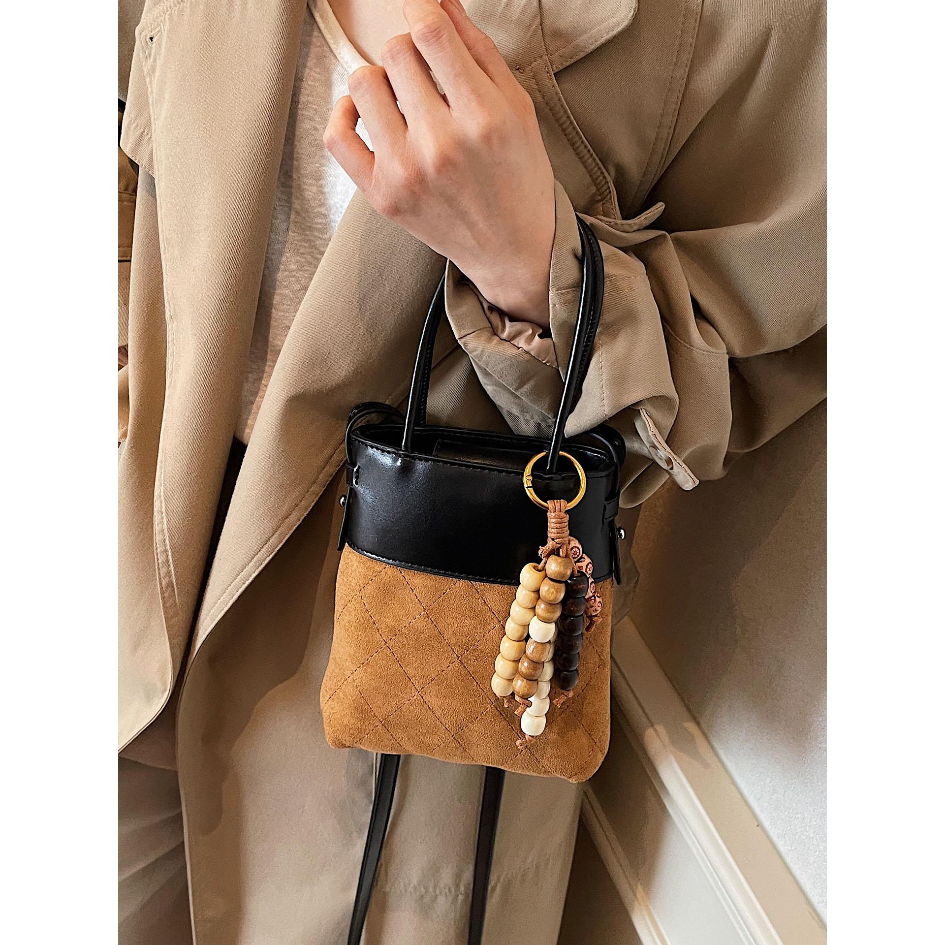 时尚小众设计包2025拼接麂皮绒韩版日常通勤手提包女式斜挎包