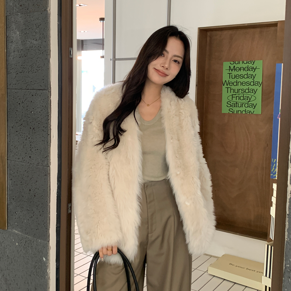 古堡黄昏托斯卡纳卷毛羊皮毛一体外套女海宁厂家皮草大衣冬65123