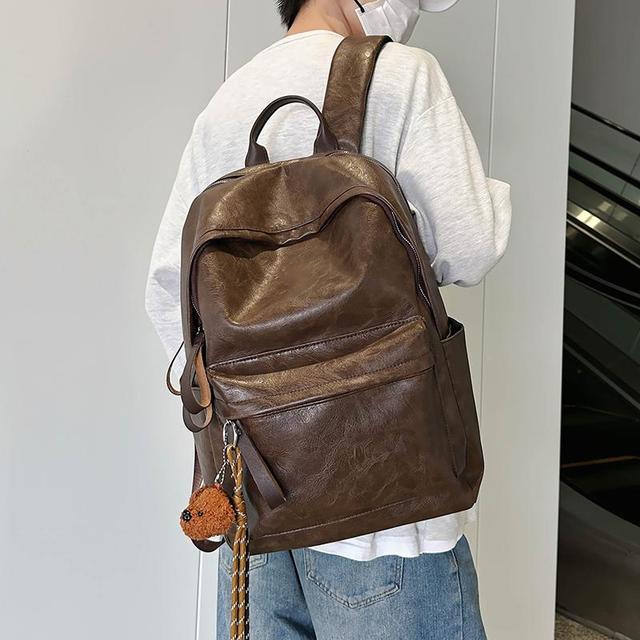 书包男大学生高中初中生简约大容量电脑背包PU皮高级感通勤双肩包