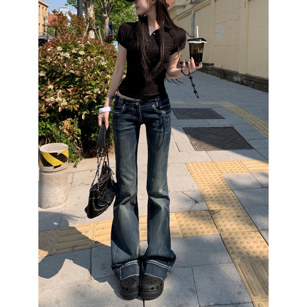 复古简约设计感深蓝微喇牛仔裤女2025新款辣妹显瘦低腰修身微喇裤