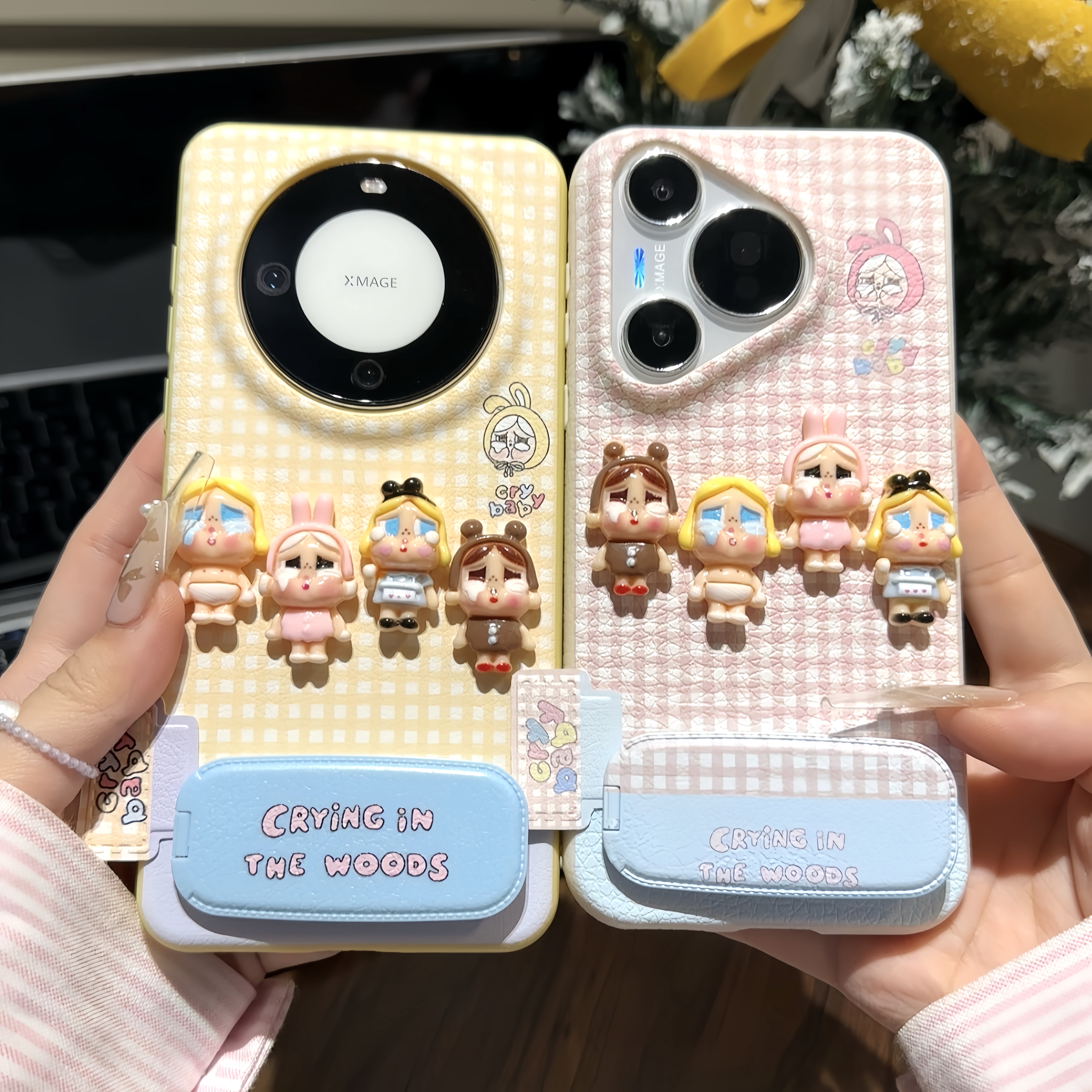 立体格子哭娃公仔支架适用苹果16/17promax手机壳华为vivoppo小米